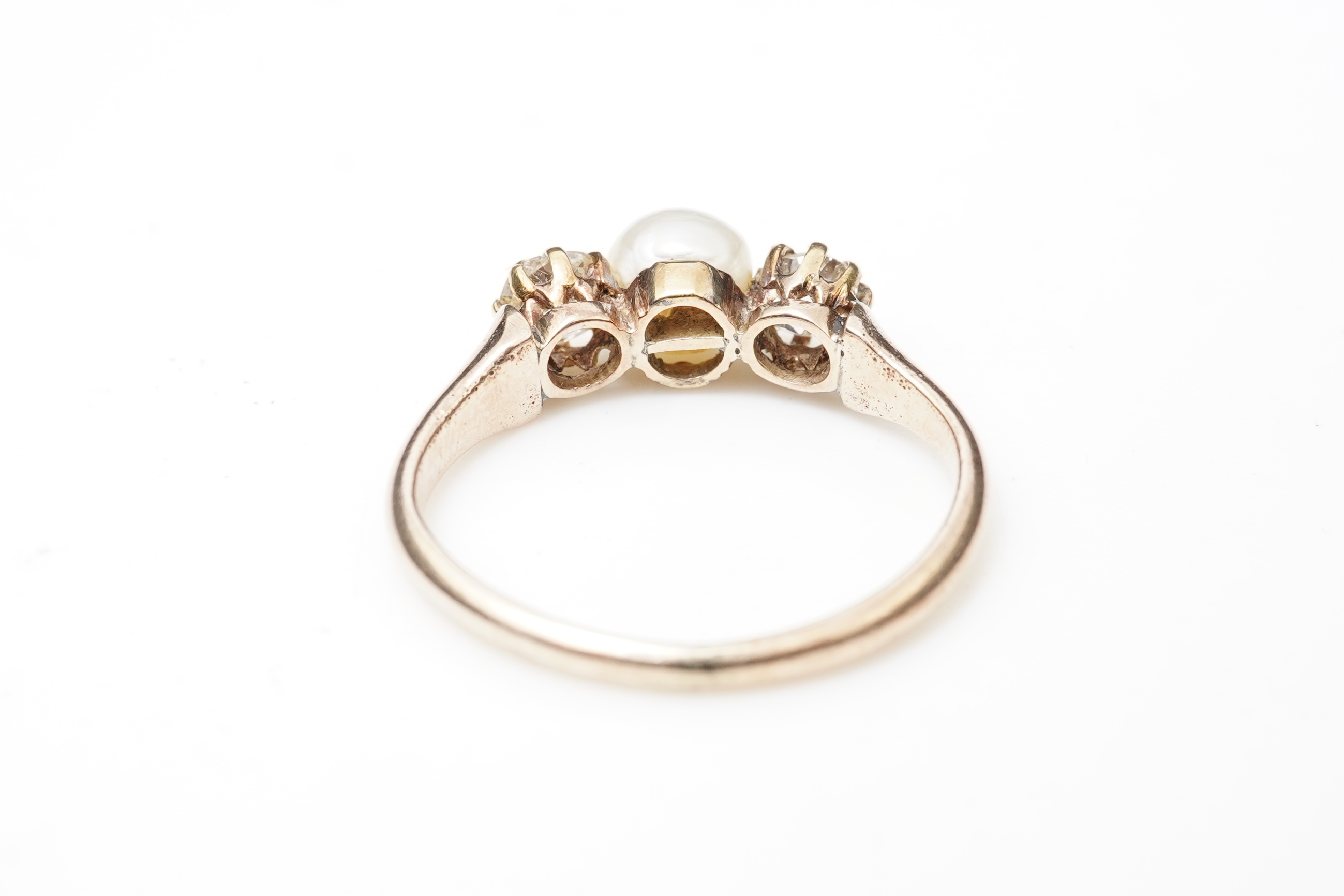 A late Victorian pearl and diamond ring, circa 1900